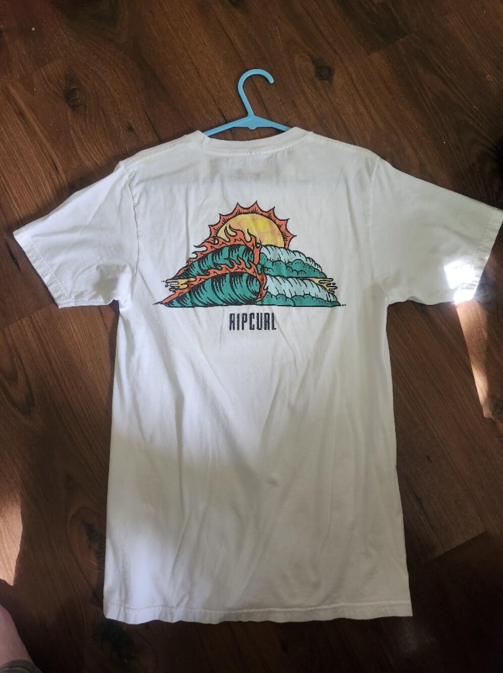 Rip Curl White Graphic Tee with Sunset Wave Design